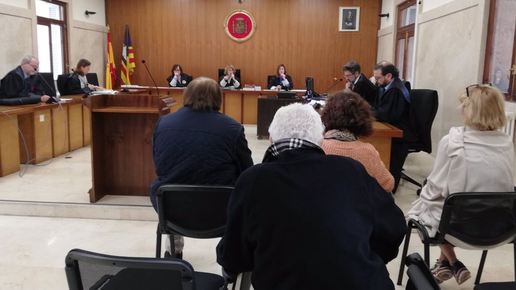 Los cuatro acusados por la venta fraudulenta de unos solares en Mallorca.