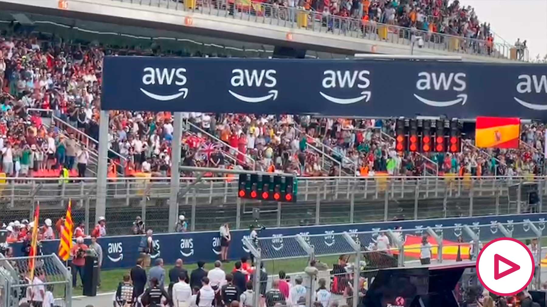 Sainz and Alonso listened embracing and moved to the Spanish anthem at the Circuit de Catalunya
