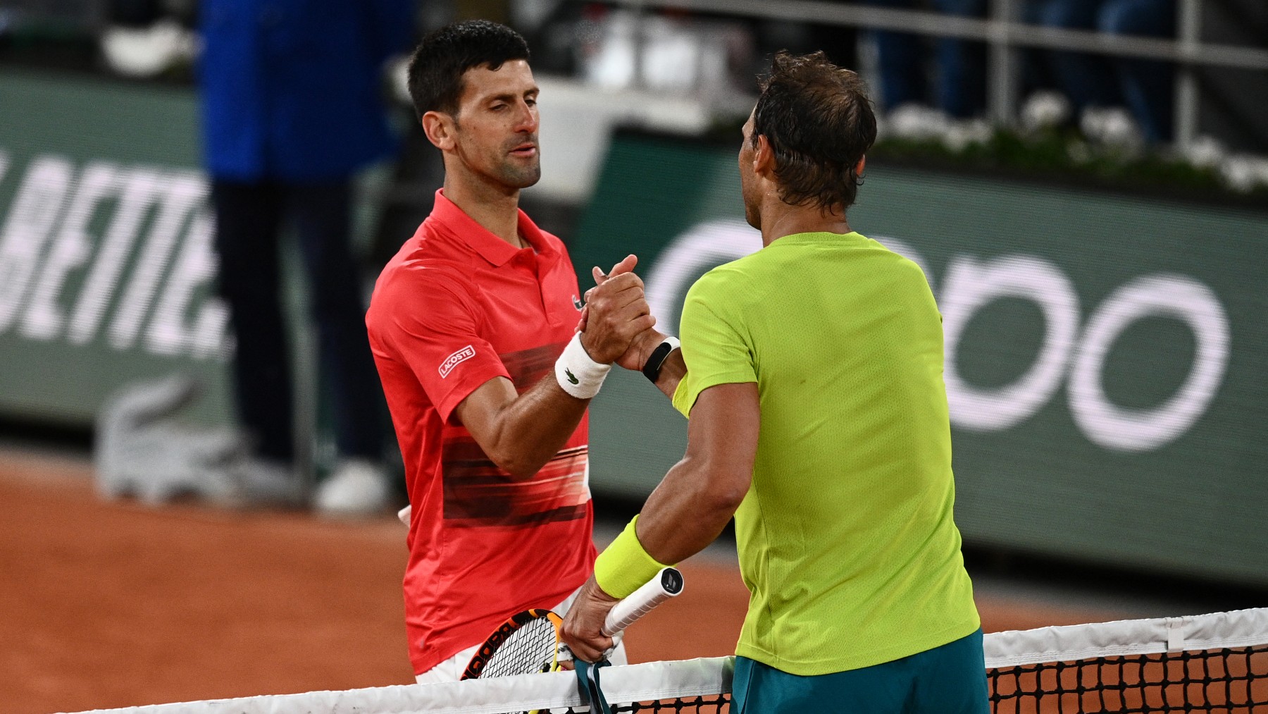 Novak Djokovic y Rafa Nadal, en su último duelo en Roland Garros. (AFP)