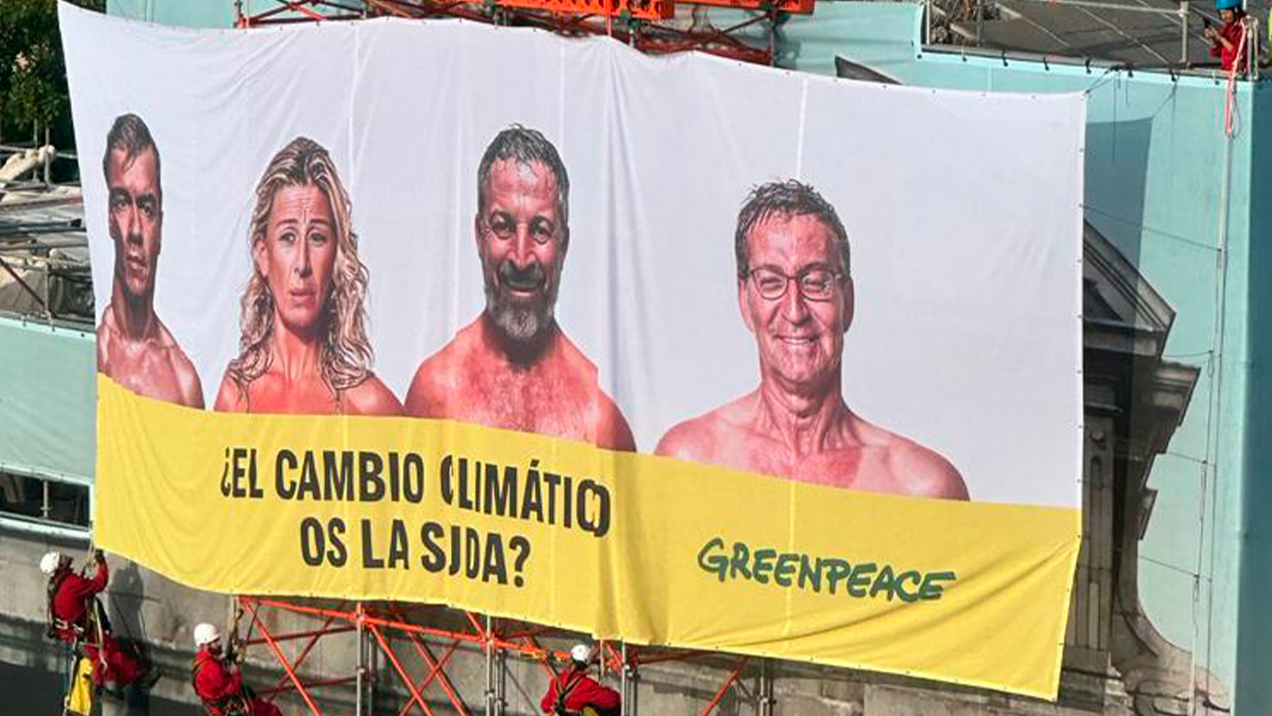 Greenpeace toma la Puerta de Alcalá con las fotos de los candidatos: «¿El cambio climático os la suda?»
