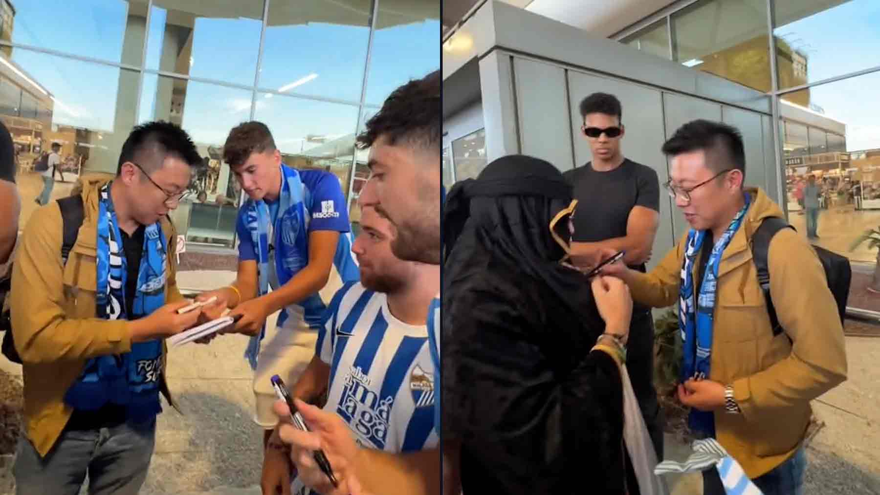 Un grupo de amigos reciben a un hombre en un aeropuerto como si fuera famoso
