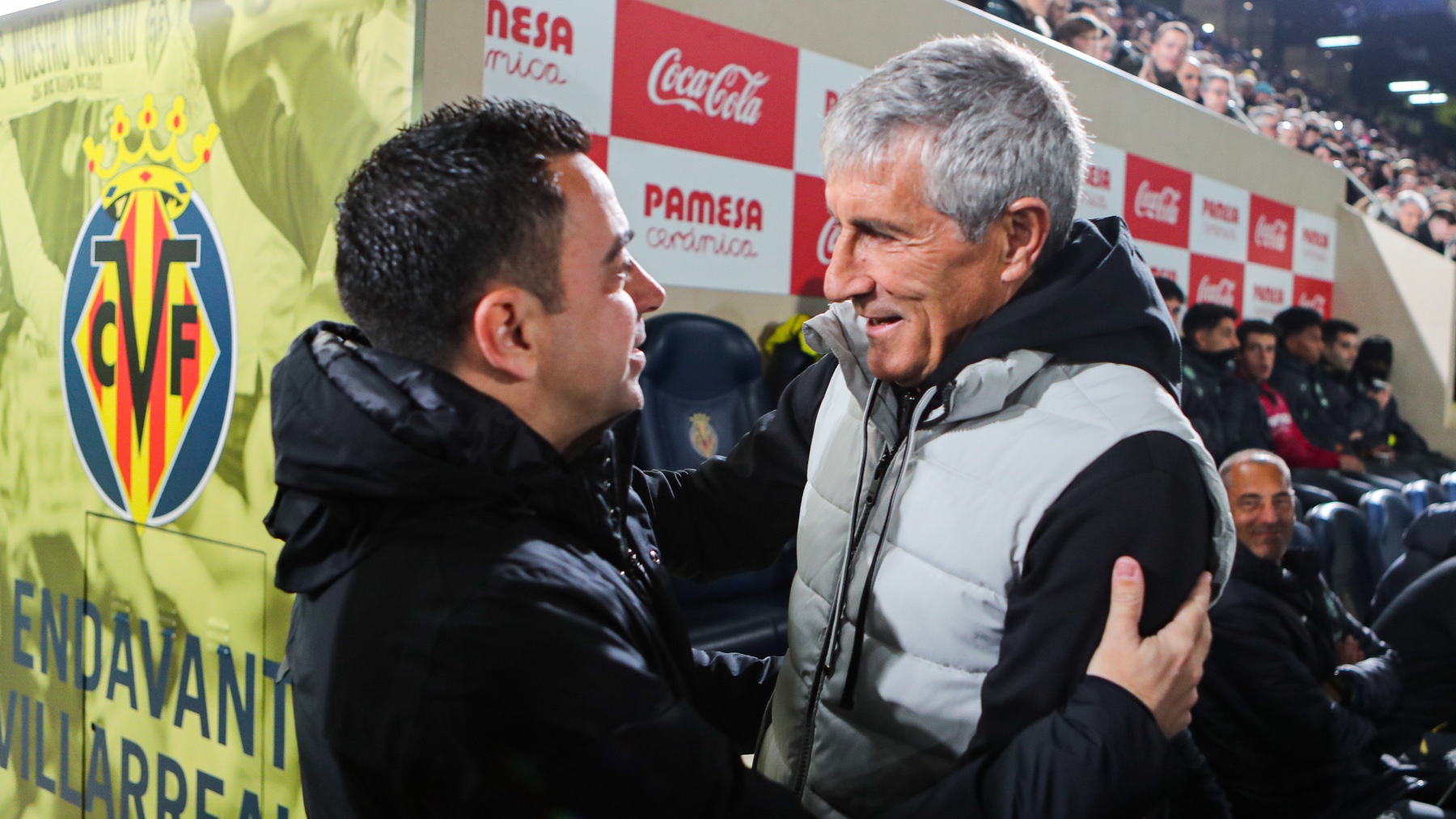 Xavi Hernández y Quique Setién, durante un partido esta temporada. (EP)
