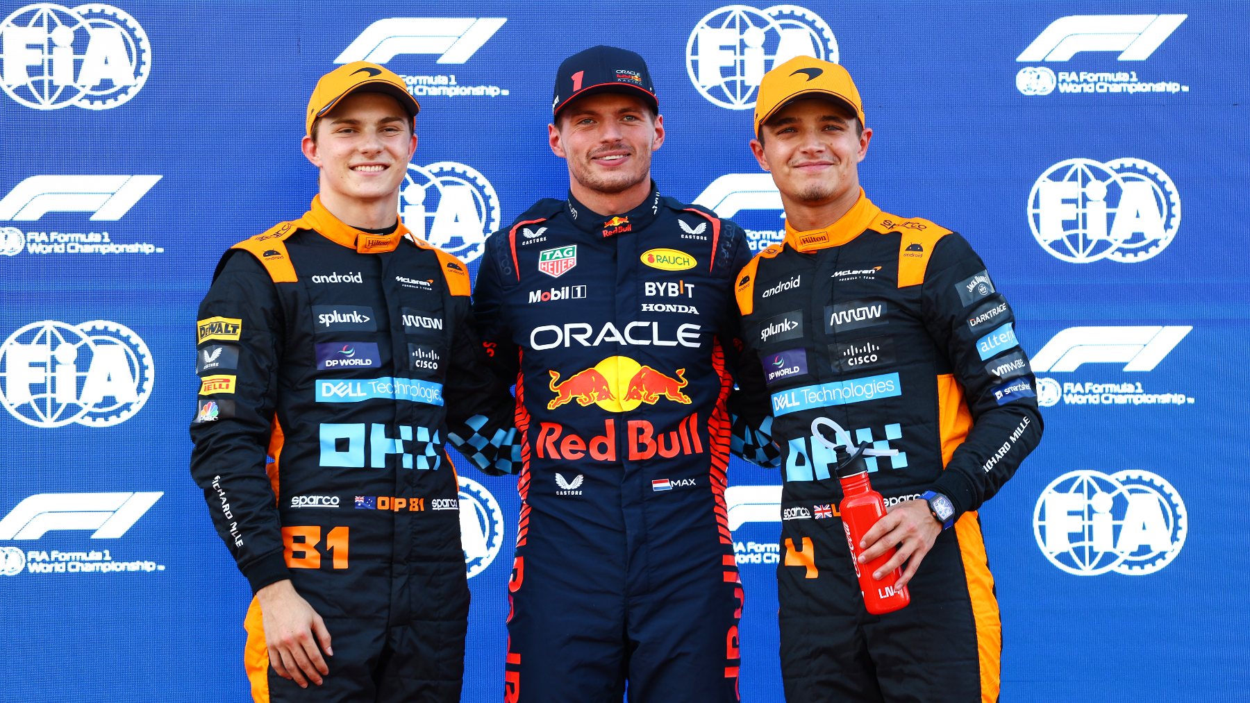 Max Verstappen junto a Lando Norris y Oscar Piastri en el podio. (Getty)
