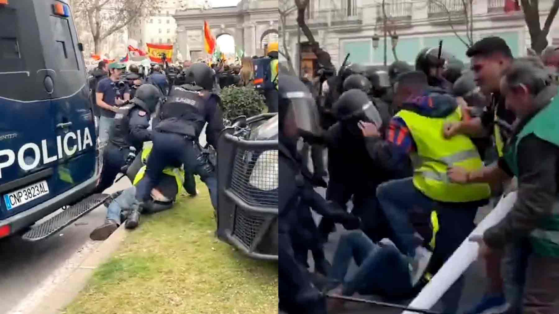 Policía cargando contra agricultores y ganaderos que se manifiestan en Madrid.