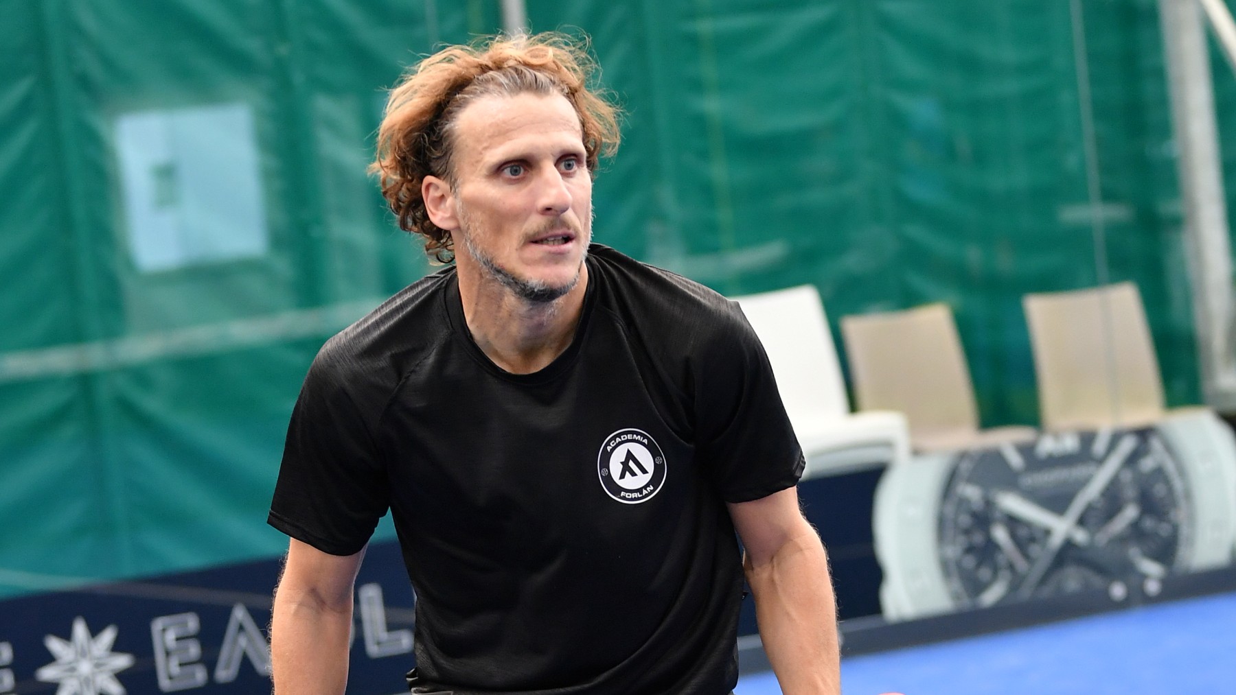 Diego Forlán, jugando a pádel.