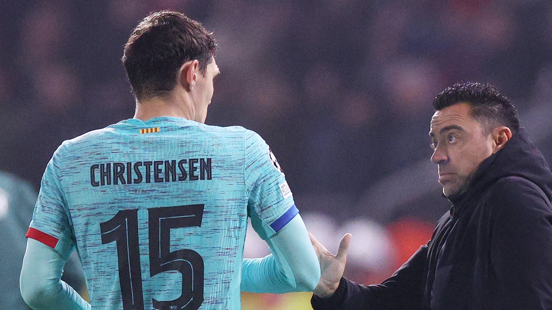 Christensen y Xavi durante un partido del FC Barcelona. (Getty)