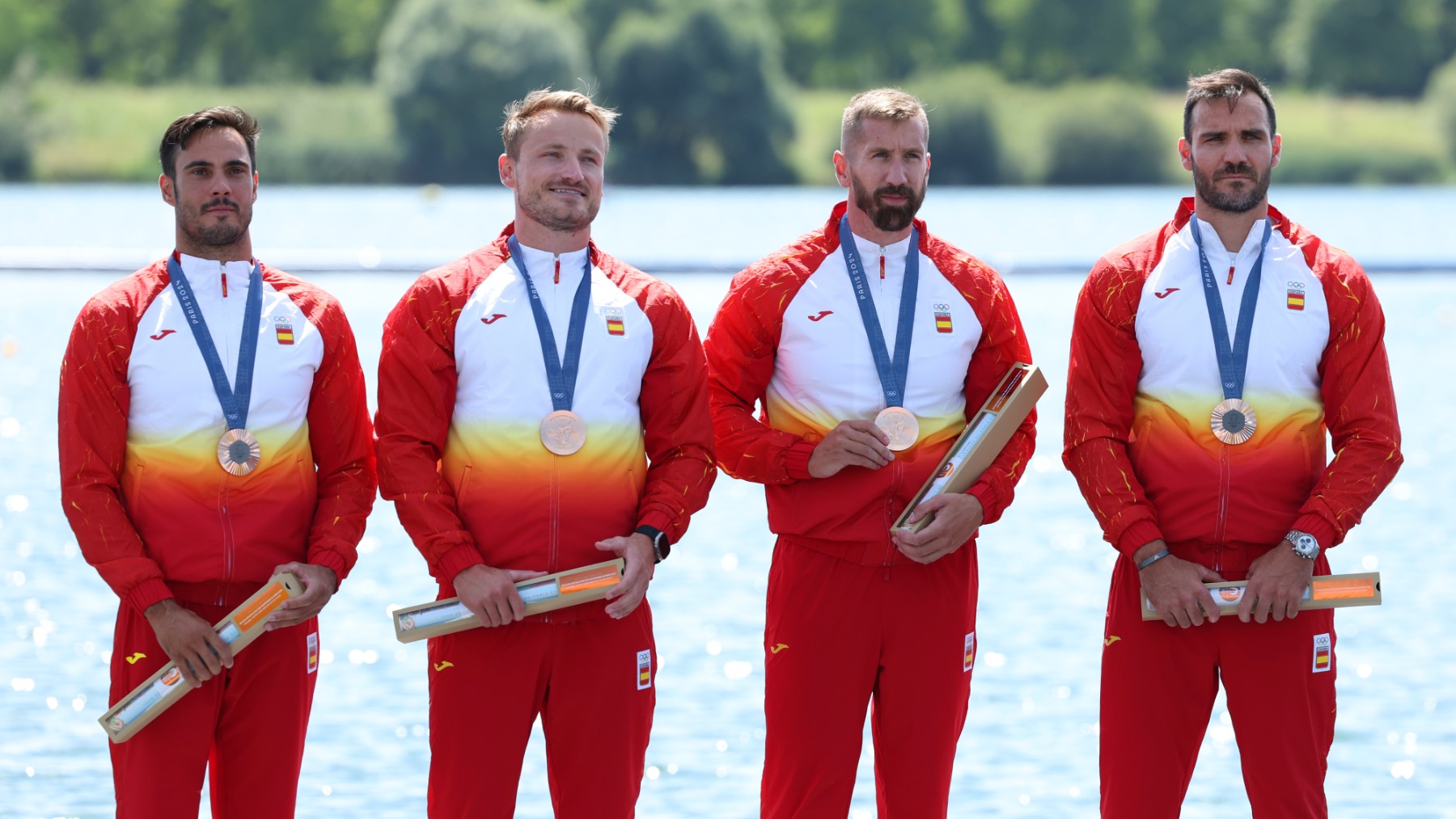 Rodrigo Germande, Marcus Cooper, Carlos Arévalo y Saúl Craviotto, en el podio. (Getty)