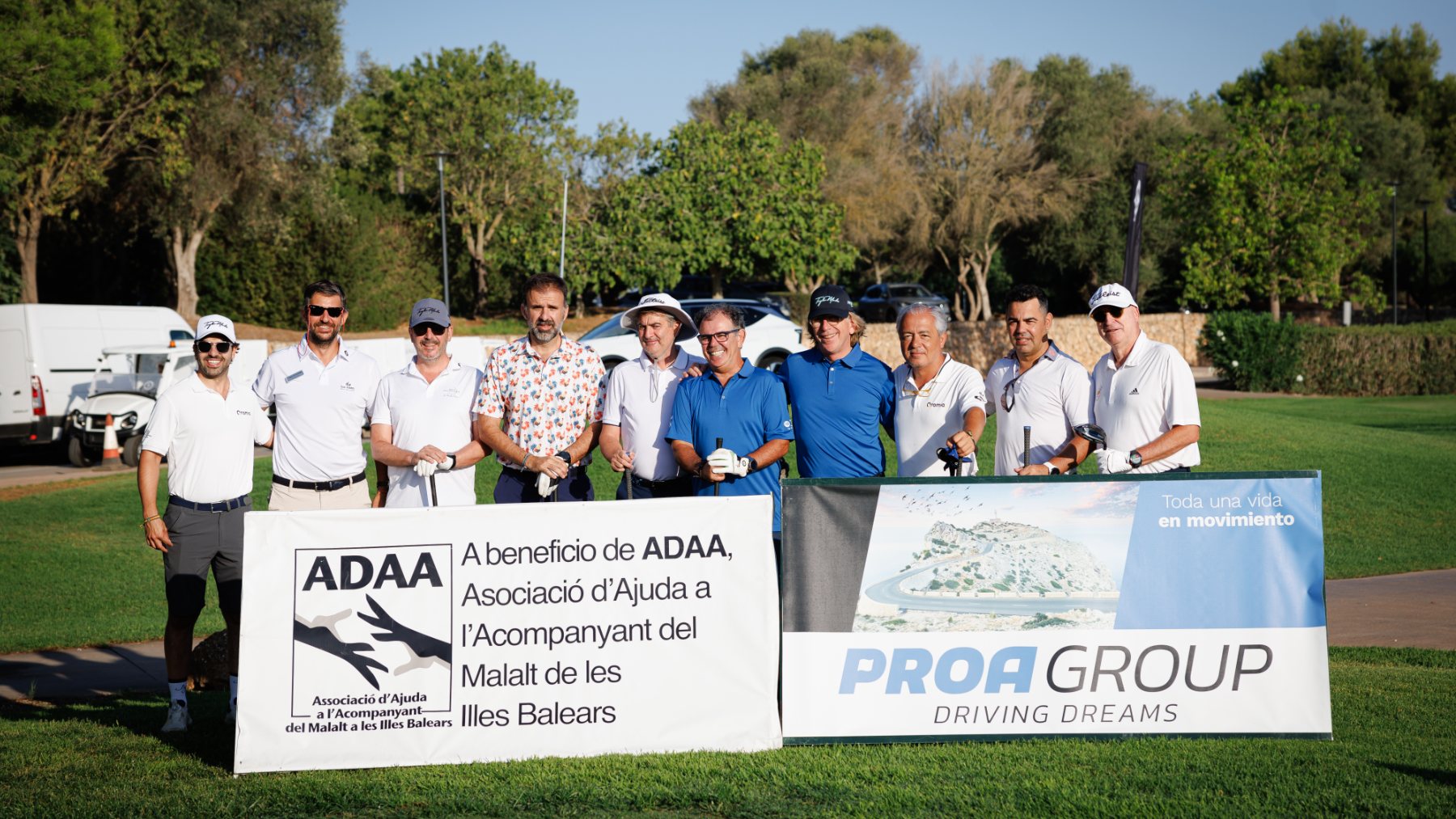 Imagen de los ganadores y organizadores.