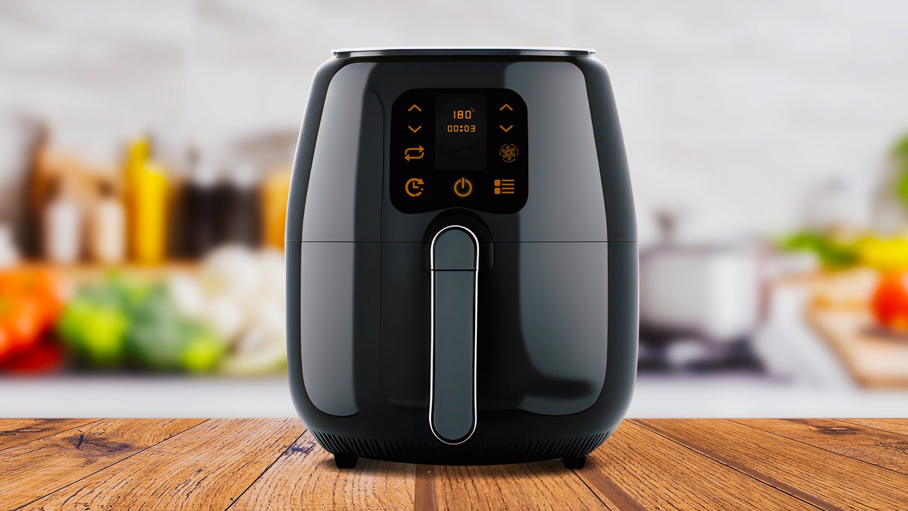 Air fryer machine cooking potato fried in kitchen. Lifestyle of new normal cooking