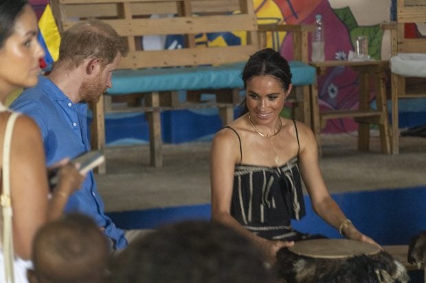 El príncipe Harry con Meghan Markle en un acto público