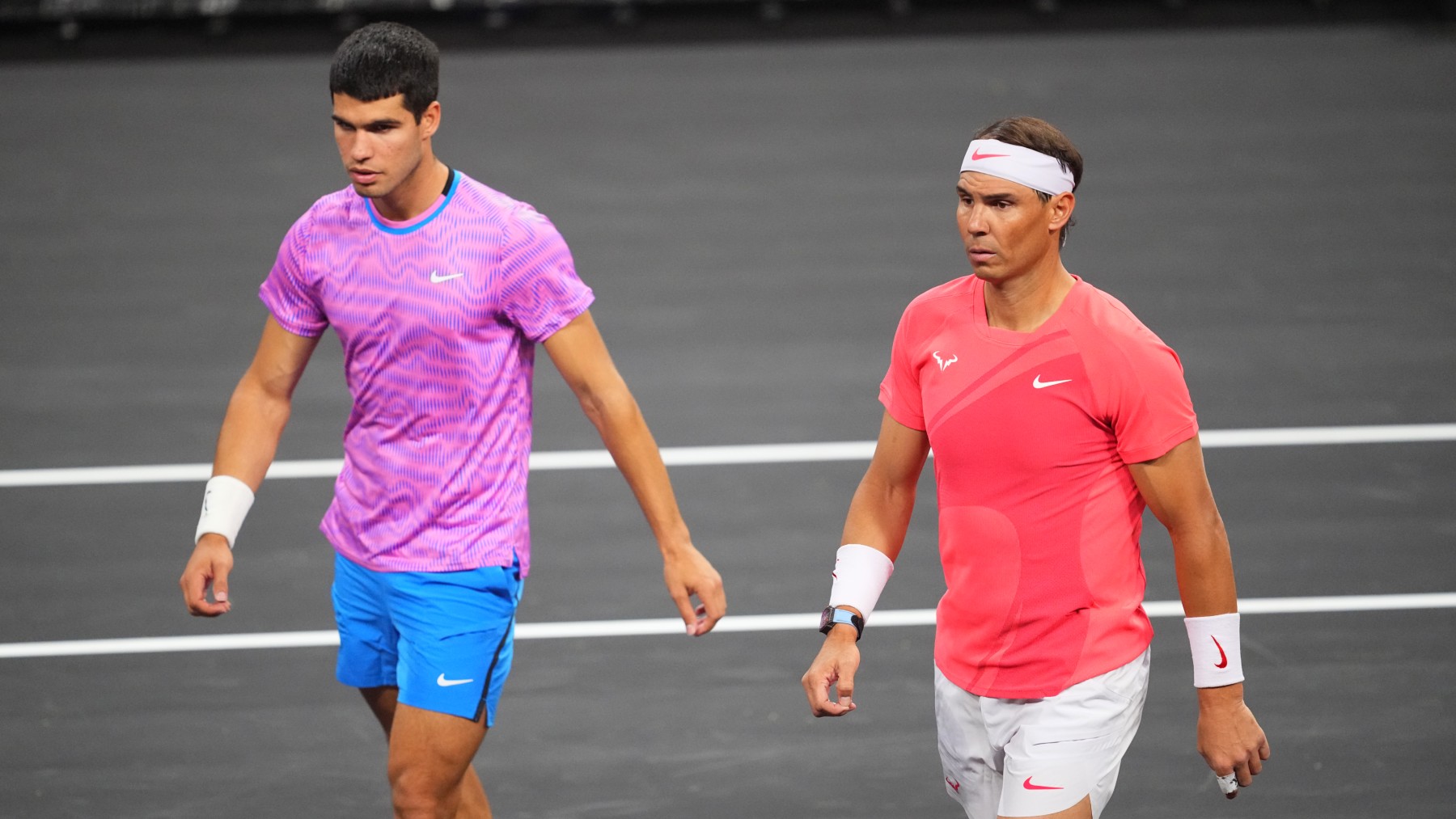 Carlos Alcaraz y Rafa Nadal, en un partido. (Getty)