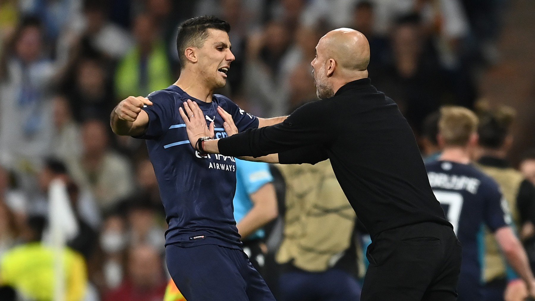 Guardiola y Rodri durante un partido del Manchester City. (Getty)