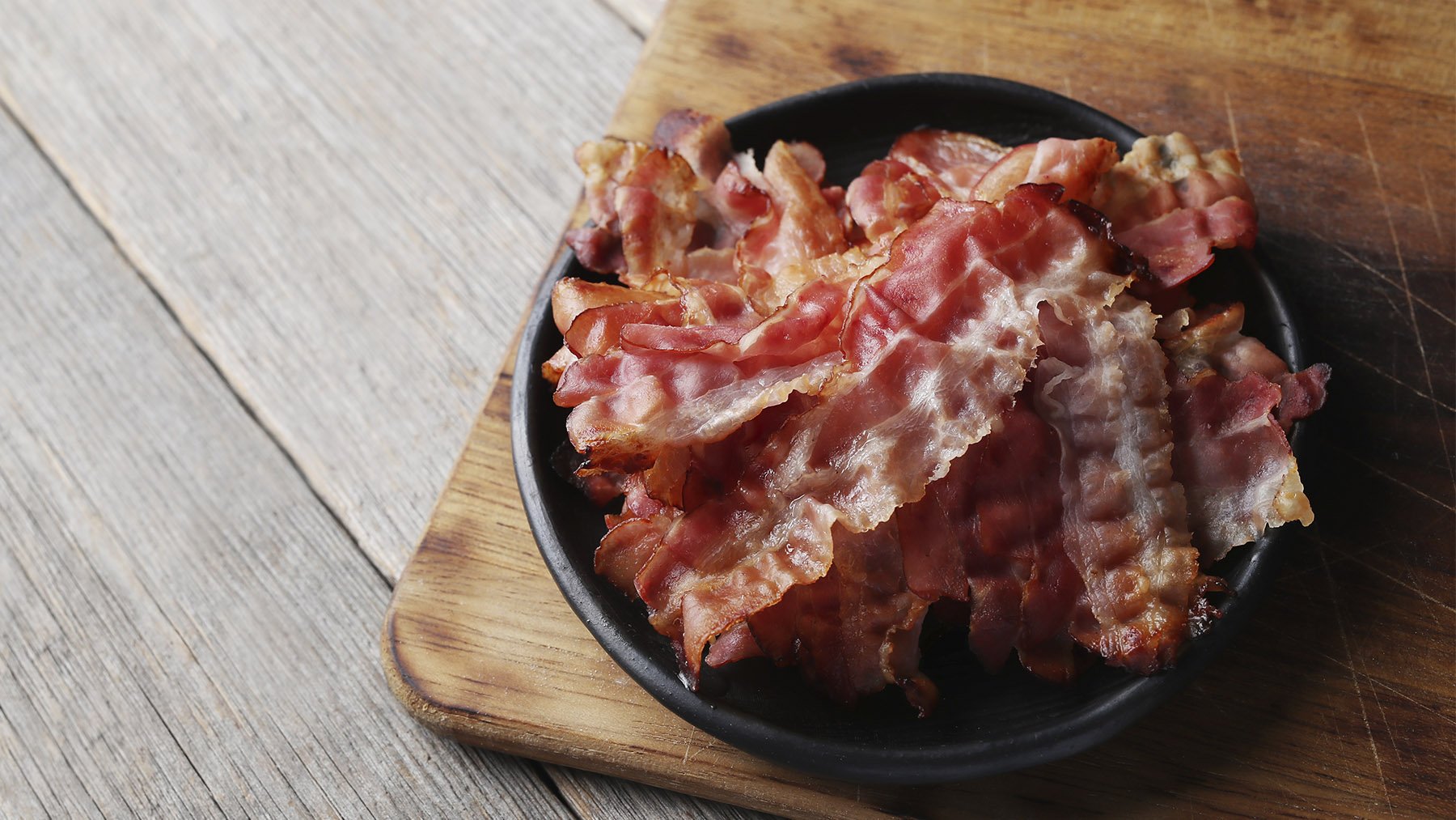 Bacon cocinado. Foto: Freepik.