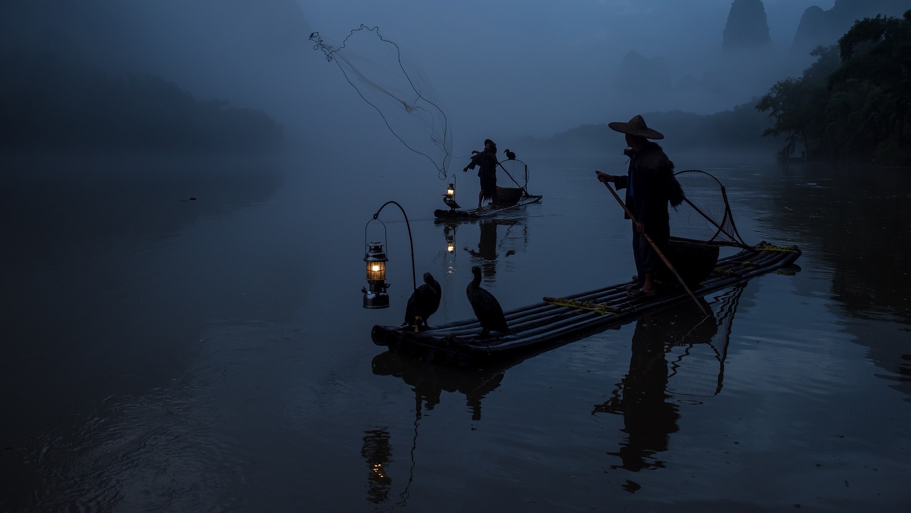 Pescadores de noche.