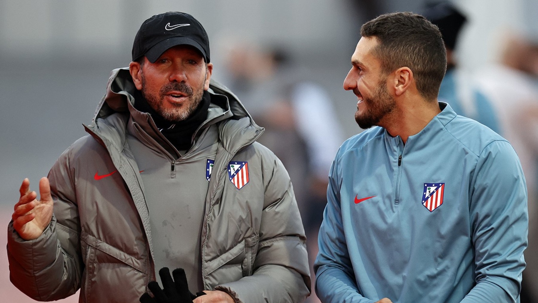 Simeone junto a Koke, en un entrenamiento.