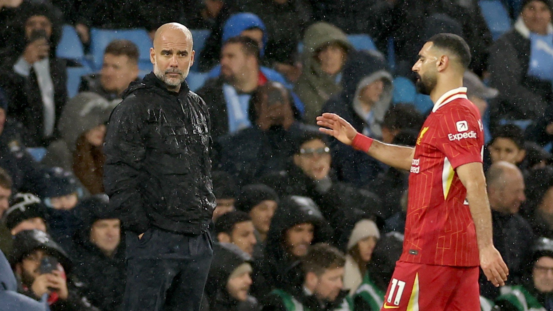 Guardiola y Salah, en el City-Liverpool. (EFE)