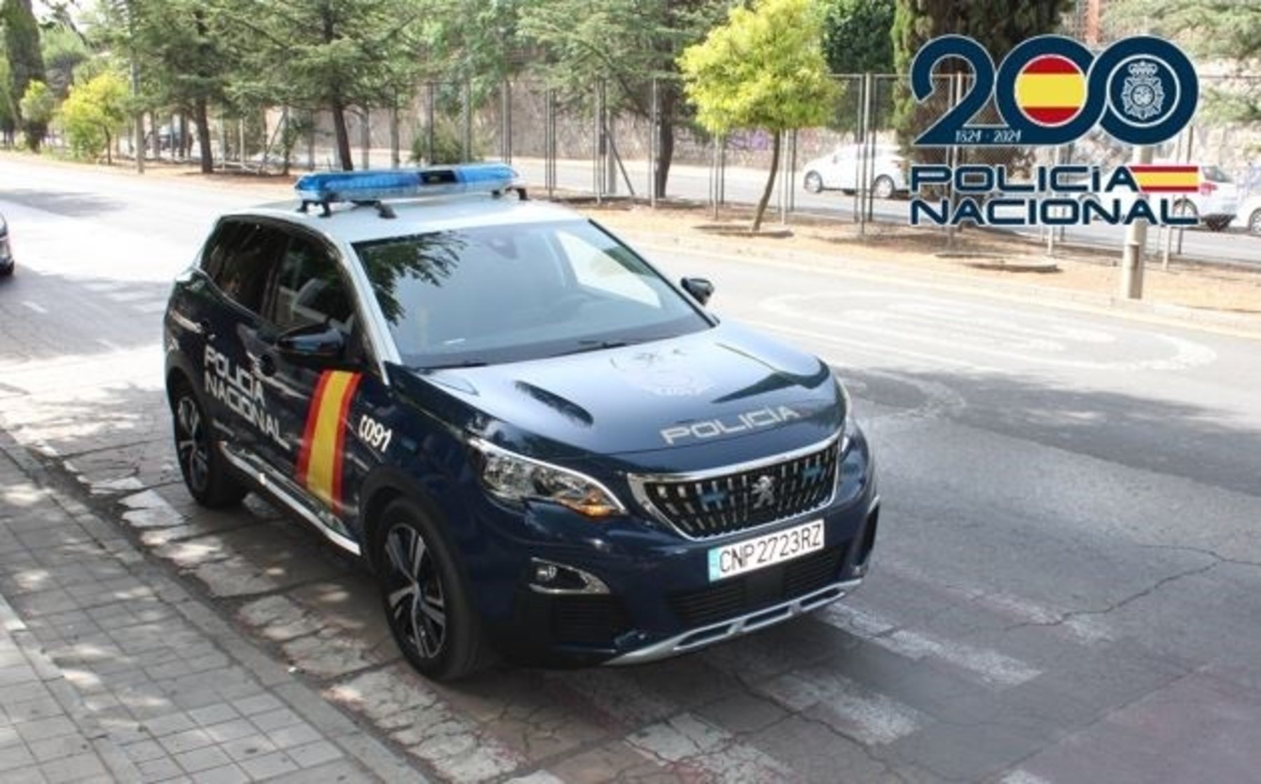 Vehículo patrulla de la Policía Nacional en Granada.