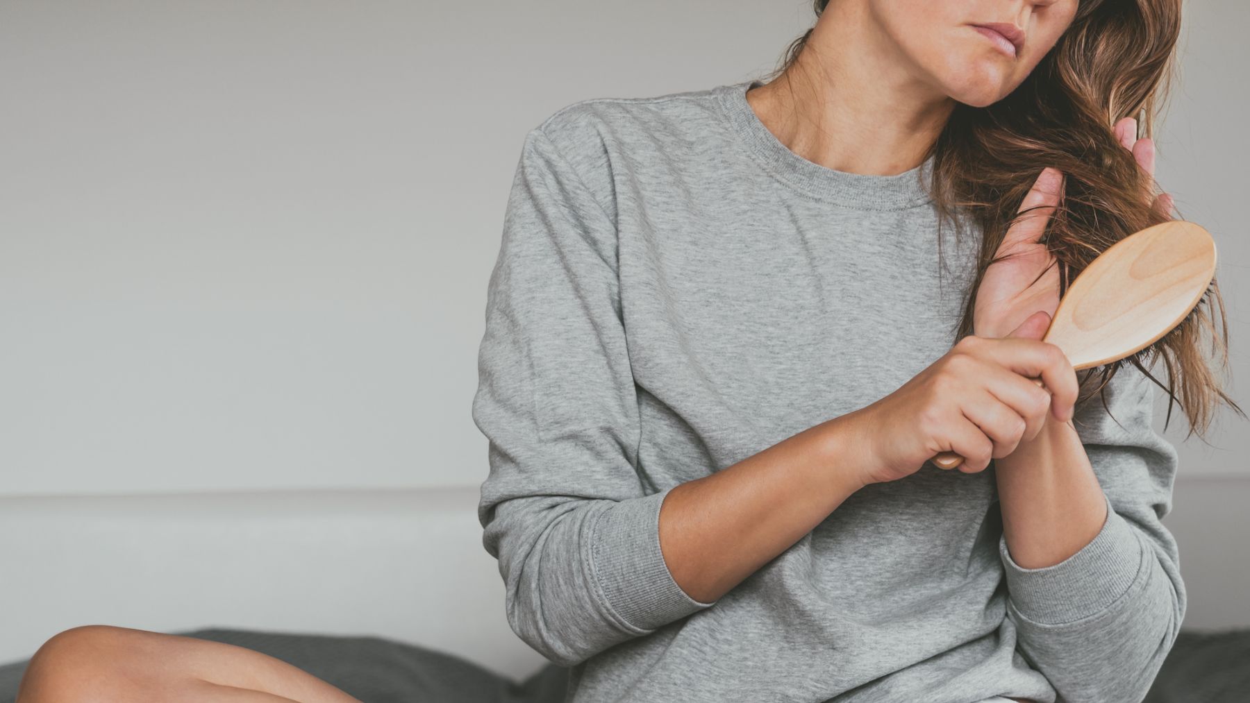 Problemas de caída del cabello en mujeres. @Istock