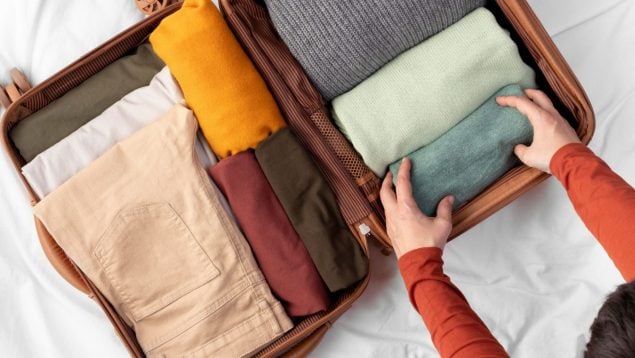 Ropa, maleta, truco, organización