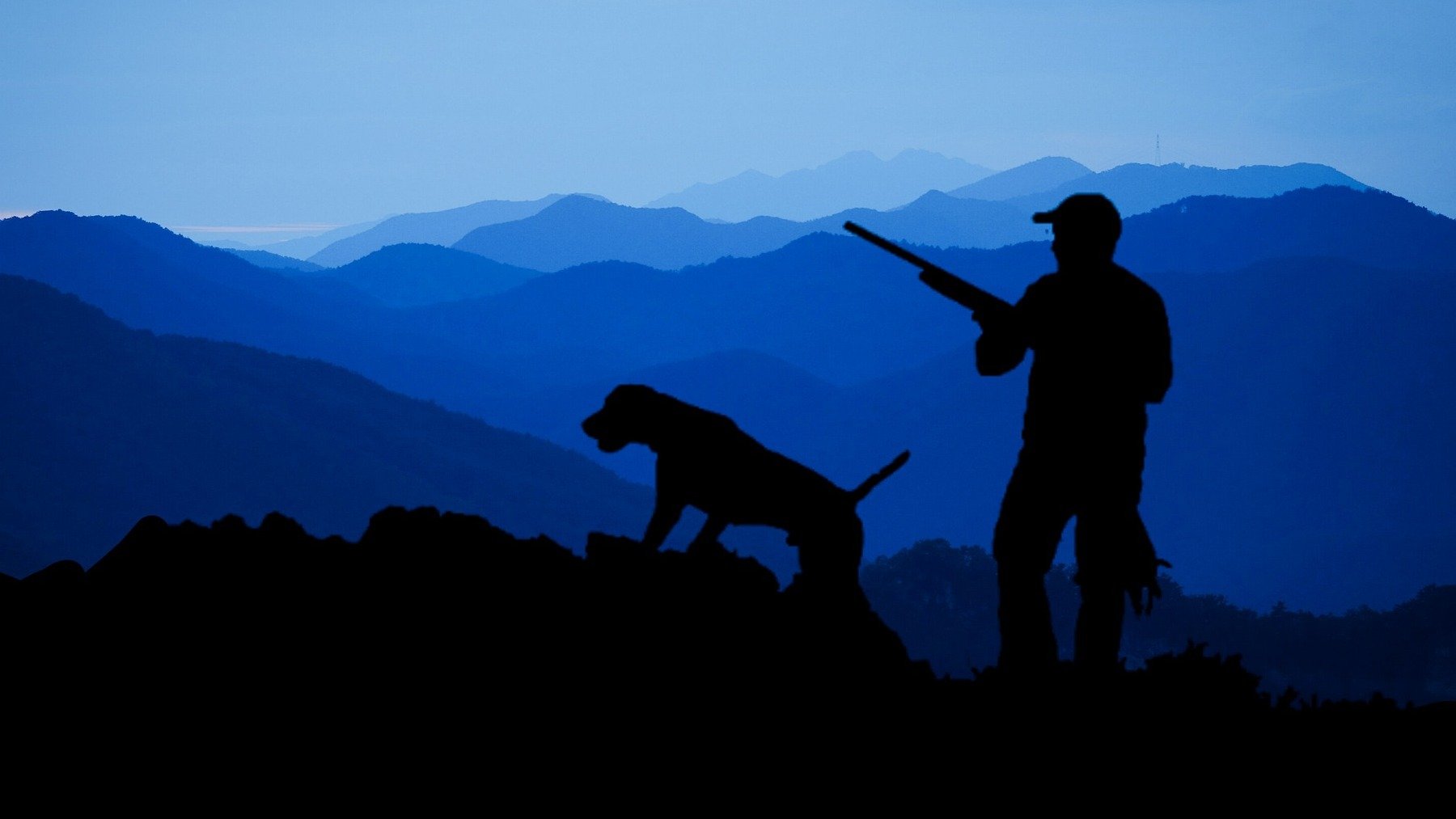 Cazador con su perro.