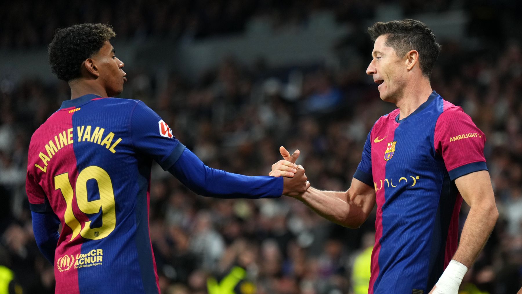 Lamine Yamal y Lewandowski. (Getty)