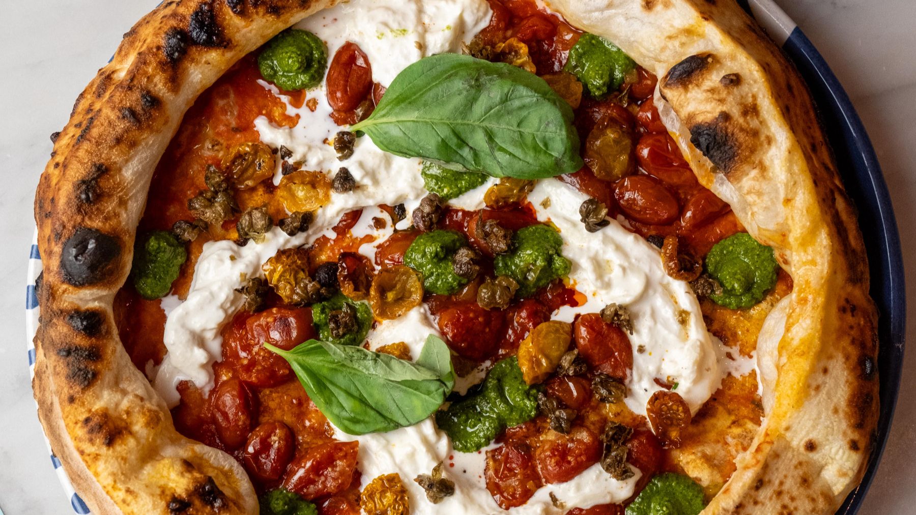 Está entre los 10 mejores del mundo y está en Madrid: el restaurante que conquista a los adictos a la pizza de verdad