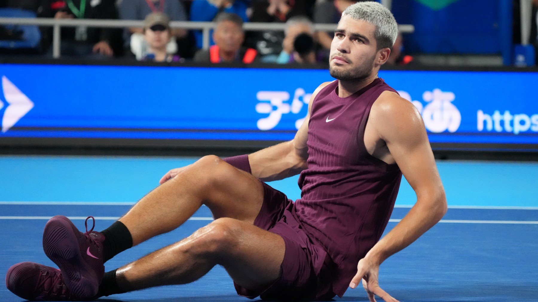 Alcaraz tras torcerse el tobillo contra Baez. (Getty)