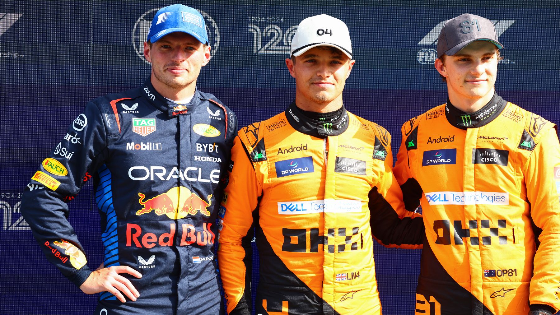 Norris junto a Verstappen y Piastri. (Getty)