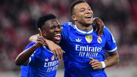 Vinicius y Mbappé celebran un gol.