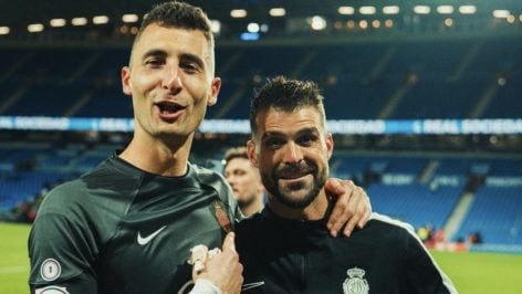 Cuéllar, junto a su ex compañero Dominic Greif.