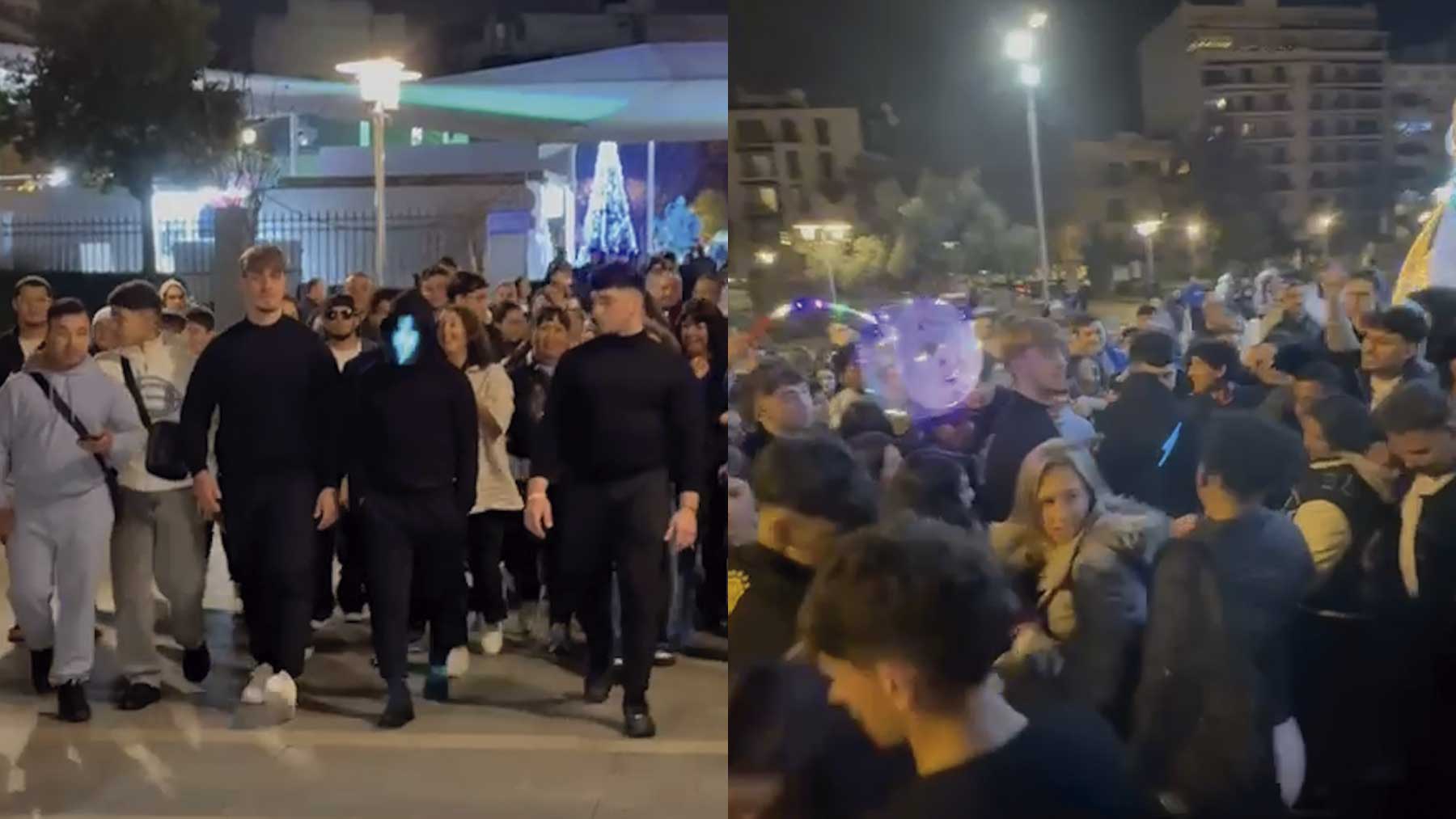 Una marea humana sigue en Palma al enigmático hombre de la máscara mientras reparte premios y viajes