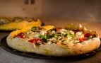 Cómo se pronuncia pizza en español según la RAE, por qué pizza es un extranjerismo crudo, cómo decimos pizza en castellano, cómo se escribe pizza en español según la RAE.