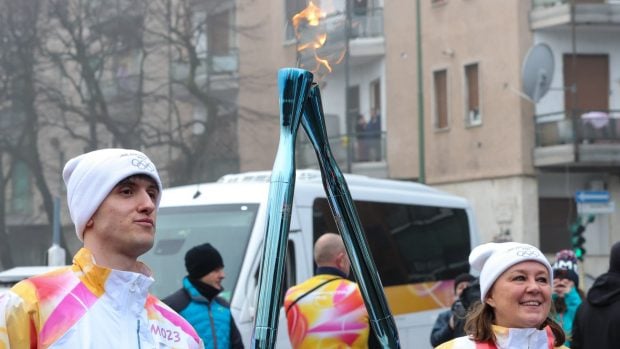 La llama olímpica Cortina