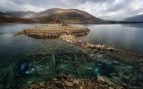 Stonehenge y neolítico, monumentos neolítico en Escocia, arqueología del Neolítico, descubrimiento arqueológico en Escocia, isla artificial de la prehistoria.