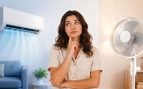 Muchas personas tienen dudas a la hora de decantarse por el ventilador o el aire acondicionado para afrontar el calor veraniego. Generado por IA.