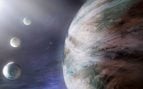 Un planeta en el espacio con sus lunas. Foto: Freepik