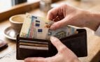 Los billetes en la cartera