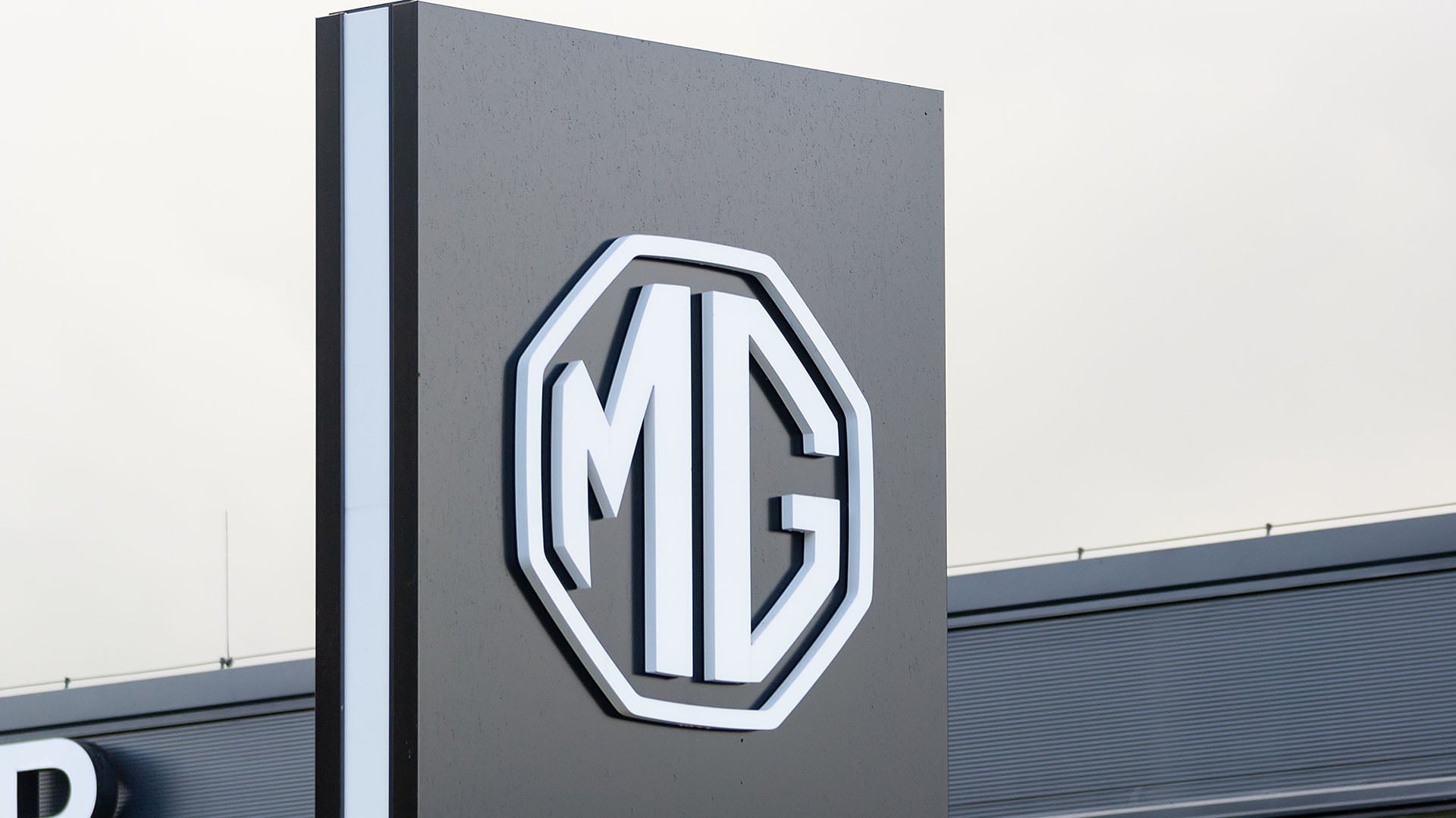 Logo de MG