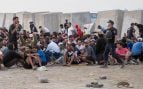 La Policía se despliega en El Trampolín de Ceuta para desalojar a los 4.000 inmigrantes ilegales que acampan en la playa