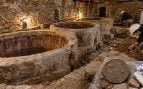 Restauración priorato en León, bodega en Ponferrada arqueología, descubrimiento arqueológico en Ponferrada, moneadas antiguas en Ponferrada, hallazgo arqueológico en obras de restauración.