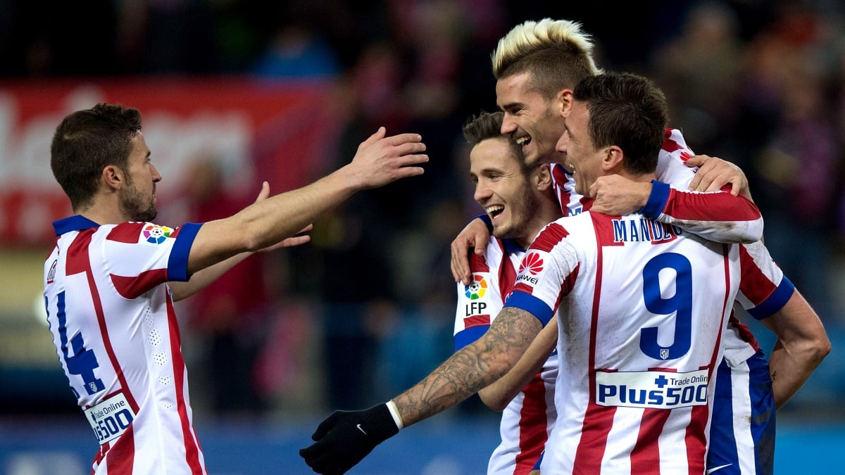 Gabi, Saúl, Griezmann y Mandzukic celebran un gol del Atlético