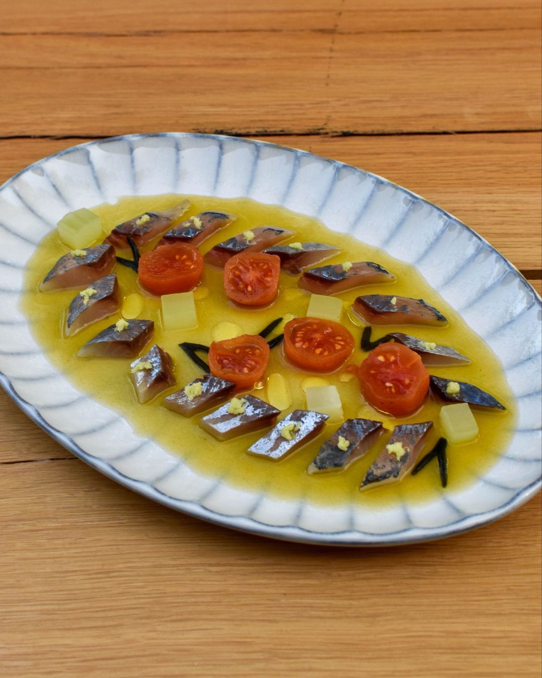 Jurel con ponzu marino y cherrys