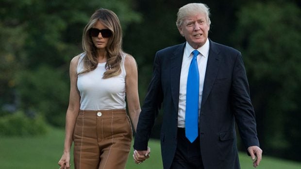 Donald Trump con su esposa Melania y su hijo Barron 