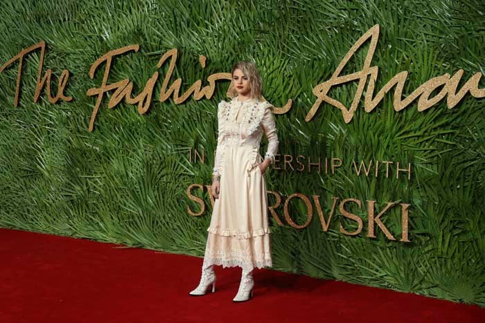 Singer Selena Gomez poses upon arrival at The British Fashion Awards 2017 in London, Monday, Dec. 4th, 2017.