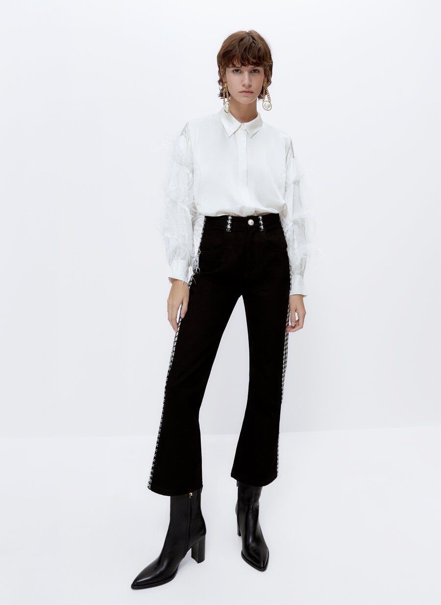La camisa de plumas de Uterq&uuml;e que puede deslumbrar a todos en la cena de empresa de Navidad