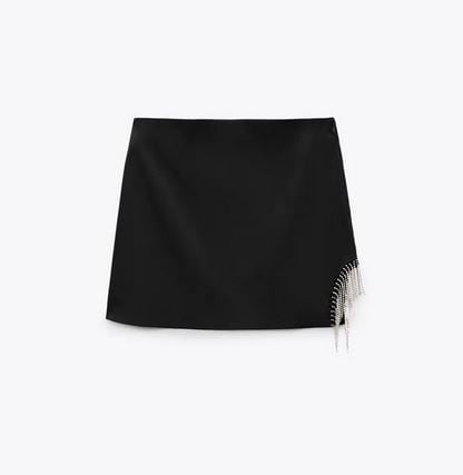 zara detalle falda flecos