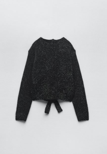 ¡Luce espalda estas navidades! El jersey de punto que te hará ir elegante estas navidades sin pasar frío