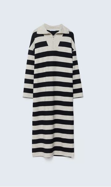 Este vestido midi de Stradivarius hace sombra a las lentejuelas y look de nochevieja
