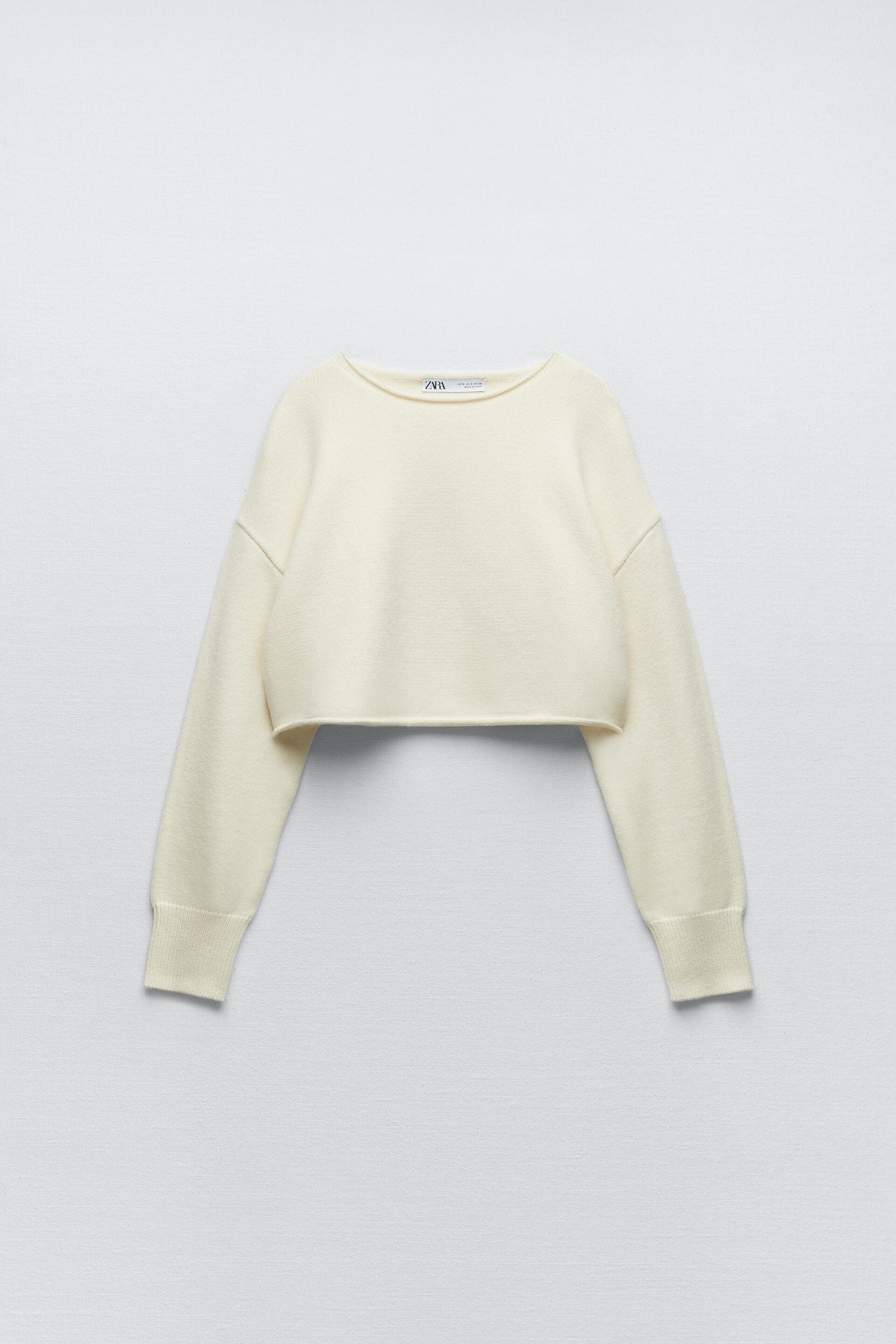 El jersey blanco de Zara que tiene lista de espera: marca tu cintura