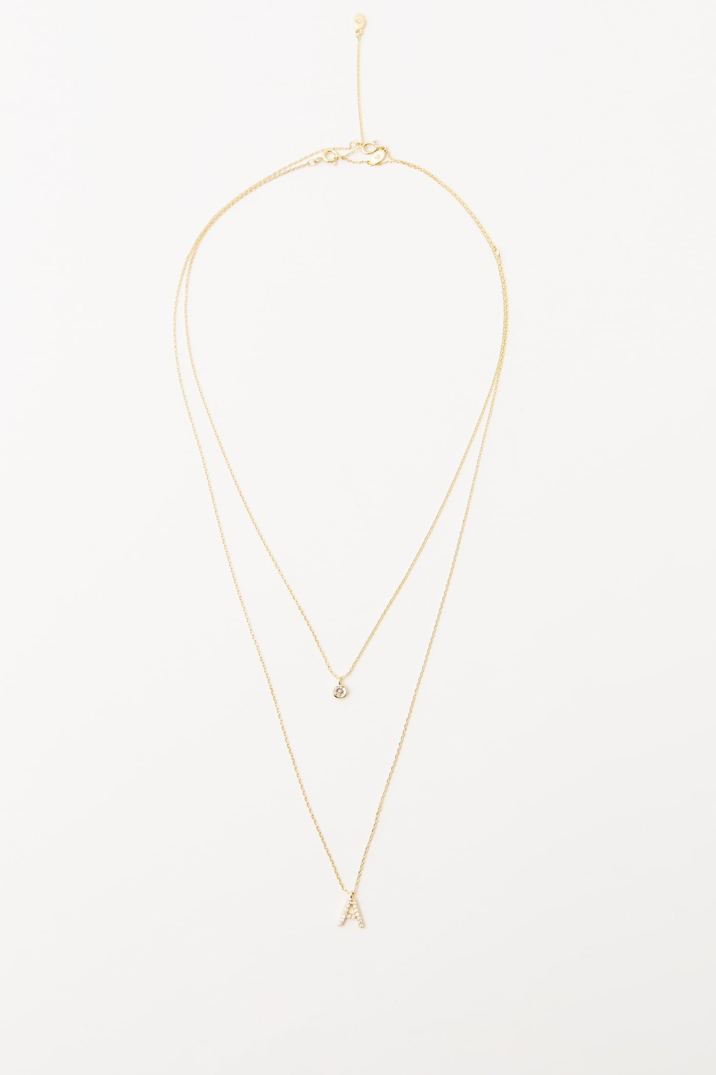Sfera tiene una amplia colecci&oacute;n de piezas de joyer&iacute;a de lo m&aacute;s especiales como este colgante doble con letra personalizada